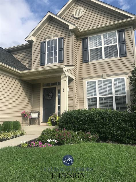 Beige or tan siding with cream trim and Benjamin Moore Temptation shutters, front door. Kylie M ...