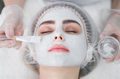 Premium Photo | Face peeling mask spa beauty treatment skincare woman getting facial care by ...