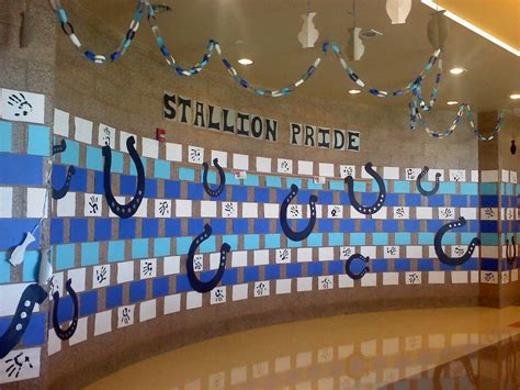 Homecoming hallway decorations using sheets of printer paper in a brick ...