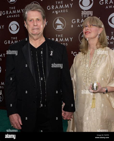 Brian Wilson and his wife Melinda arrive for the 47th annual Grammy Awards at Staples Center in ...