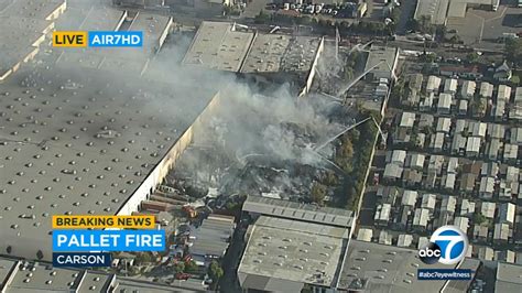 Massive 3-alarm fire fueled by burning pallets erupts at distribution ...