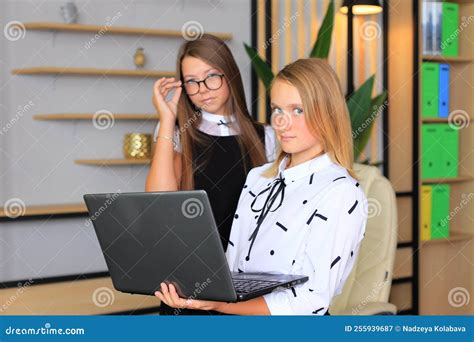 Young Girls with Laptop in College. Remote Education Stock Image ...