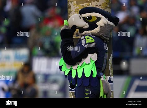 Seattle, USA. November 22, 2015. Seahawks mascot, Blitz, watches a replay during an official ...