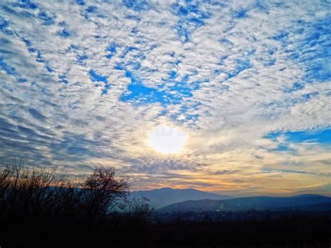 Sunset with Fluffy Clouds in the Sky Stock Photo - Image of beauty ...