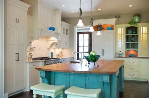 here's an island with bright color against white cabinets | Turquoise kitchen, Turquoise kitchen ...