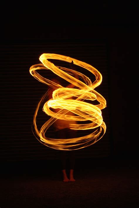 Model with fire poi. Slow shutter speed. Elements. Light. Liquid. Heat. | Lightpainting, Typografie