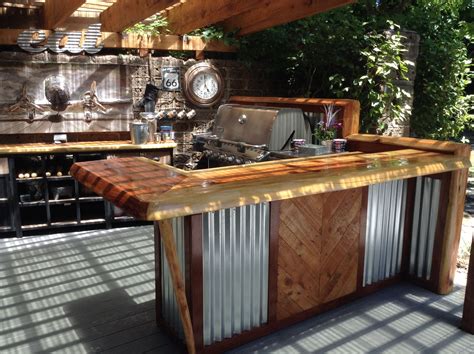 Rustic outdoor kitchen and bar. | Rustic outdoor kitchens, Outdoor ...