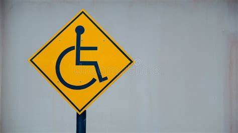Yellow Disable Handicap Parking Sign Board Placed in a Residential Area. Stock Image - Image of ...