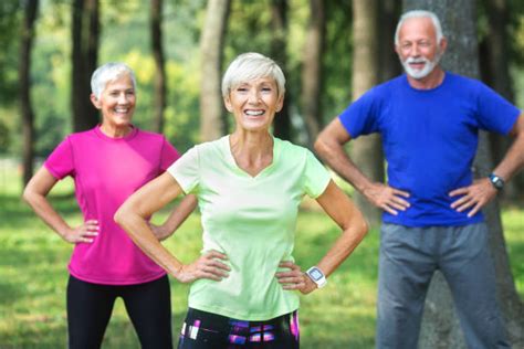 Small Group Of Old People Exercising At The Outdoor Gym Stock Photos, Pictures & Royalty-Free ...