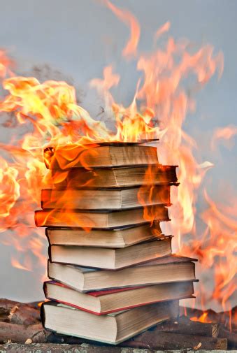 Stack Of Hardcover Burning Books Stock Photo - Download Image Now - iStock