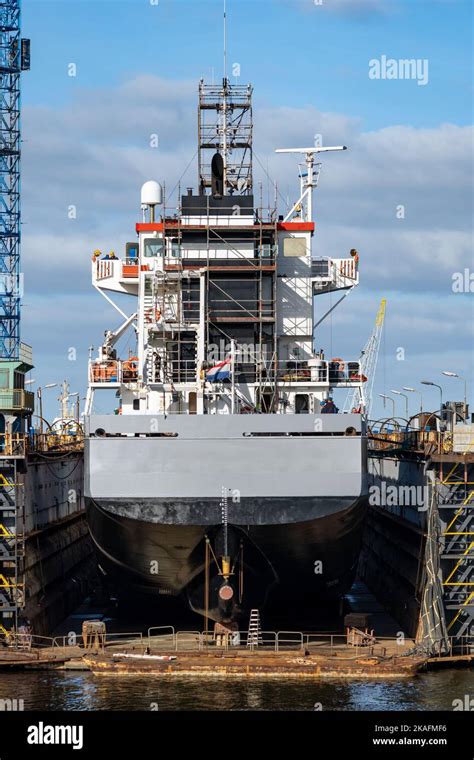 general cargo vessel in floating dock for maintenance Stock Photo - Alamy