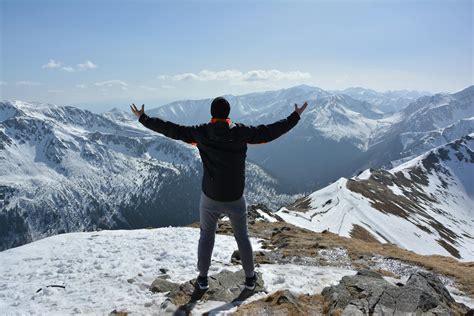 Man Standing on Mountain · Free Stock Photo