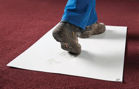 Sticky Mat, a self-adhesive entrance mat for the reduction of dust ...