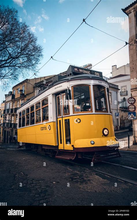 Old tram through the streets of beautiful Lisbon Stock Photo - Alamy