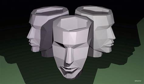 three paper sculptures of people's heads in the dark