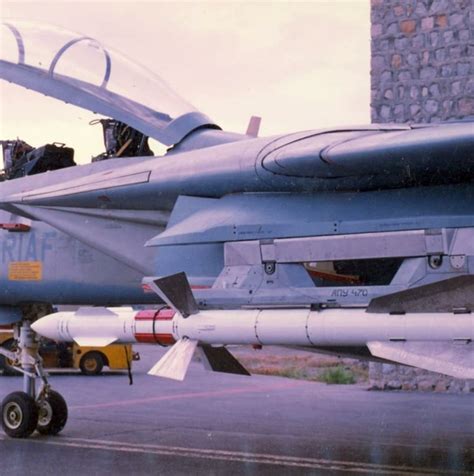 Iranian F-14 Tomcat fitted with a Russian R-27 missile during testing ...