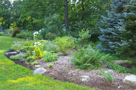 “Creating A Landscape Berm” by Dorian Winslow | womanswork.com