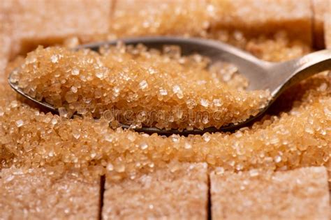 Crystals Of Raw Cane Sugar, Macro In The Foreground Stock Photo - Image ...