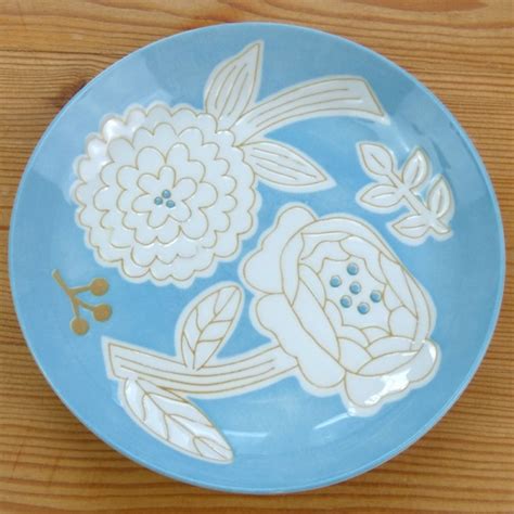 Blue Ceramic Plate with White Flower Design