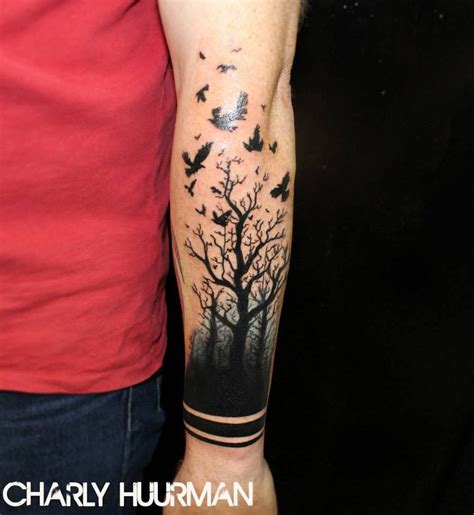 Tree Turning Into Birds Tattoo