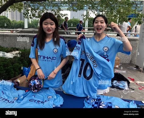 Manchester City fans at the fanzone near the Nanjing Olympic Sports ...