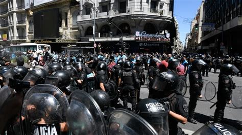 Argentina's unions take to the streets to protest president's cutbacks ...