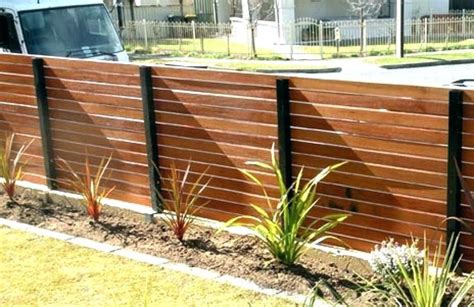 horizontal wood fence with metal posts - Google Search | Backyard fences, Fence design, Wood ...