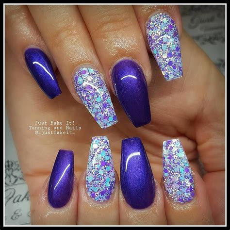 No photo description available. | Purple glitter nails, Purple acrylic nails, Purple nails