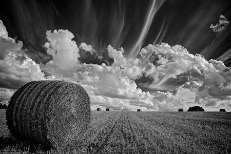 Straw Bale | Large round straw bale under a beautiful summer… | Flickr
