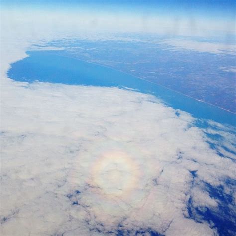 I just saw a full circle rainbow from an airplane! What do… | Flickr