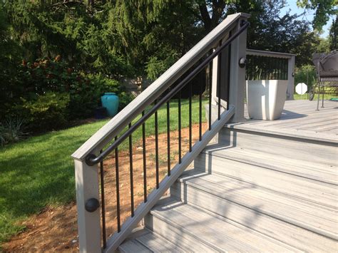 Trex Island mist decking with black ada handrailing. All of the steps are picture framed for a ...