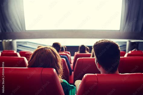 happy couple watching movie in theater or cinema Stock Photo | Adobe Stock