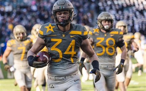 West Point football star Andre Carter now free to pursue NFL career ...