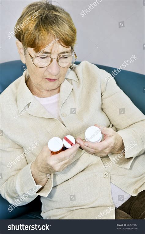 Elderly Woman Reading Warning Labels On Stock Photo 26291947 | Shutterstock