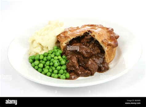 Steak pie with gravy Stock Photo - Alamy