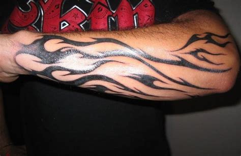 Fire Tattoo On Arm | Flame tattoos, Fire tattoo, Wrist tattoos