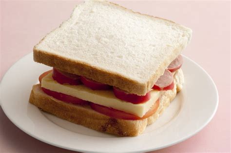 Cheese, pepperoni and tomato slice sandwich - Free Stock Image