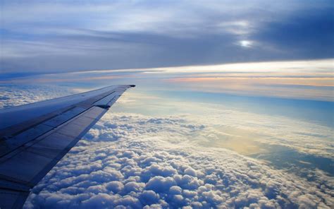 Aerial view of airplane wing above clouds HD wallpaper | Wallpaper Flare