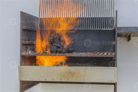 Grill with open flame 17093973 Stock Photo at Vecteezy