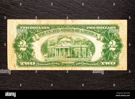 One 1953 US two dollar bill on a slate stone, close-up, top view Stock ...