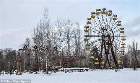 Abandoned: A frozen ferris wheel, poisoned forests and paint sloughing off an empty swimming ...