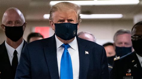 Trump finally wears face mask in public during hospital visit