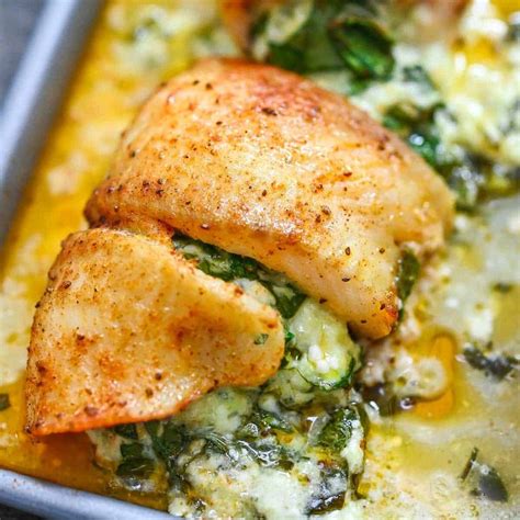 This Spinach Stuffed Flounder is a delicious mix of flaky white fish and creamy spinach ...