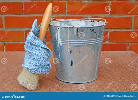 Painters bucket and brush stock image. Image of masonry - 13086239