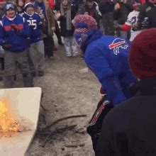 Bills Mafia Fan Smashing Table Caught On Fire GIF | GIFDB.com