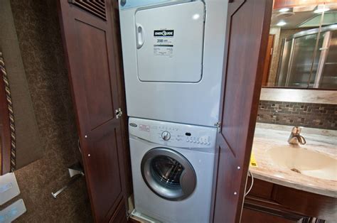 washer & dryer conveniently stacked to save space in the #newmar #RV ...