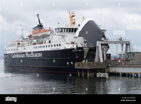 Caledonian Macbrayne ferry with open bow door loading cars at a Craignure port on the Isle of ...