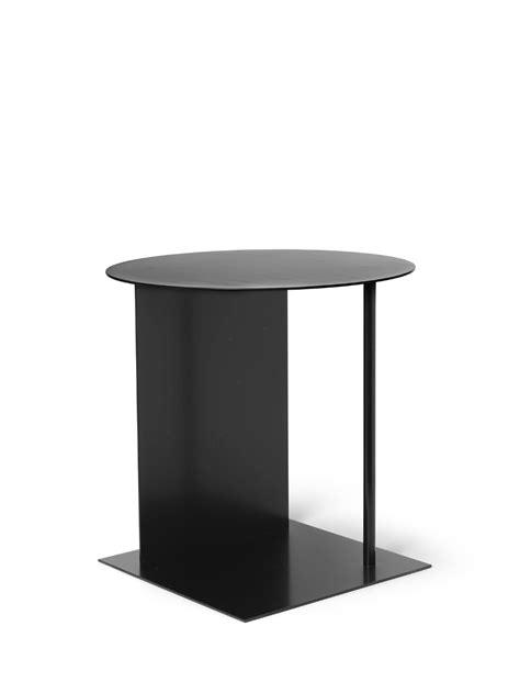 With a fluctuating expression, dependent on your perspective, the Place Side Table presents a ...