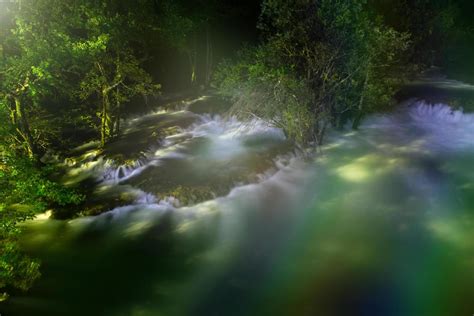 waterfalls in night 11594846 Stock Photo at Vecteezy