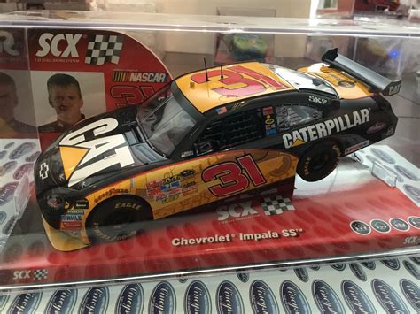 SCX 64220 Chevrolet Impala SS Caterpillar Burton Nascar 1/32 Slot Car ...